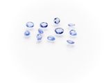 a group of blue sapphires on a white background