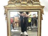 a man taking a picture of himself in a mirror