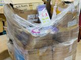 a large pile of boxes sitting on top of a pallet