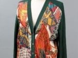 an image of a woman ' s cardigan sweater on a mannequin