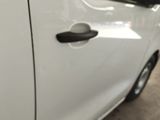 a close up of a car door handle with a black handle