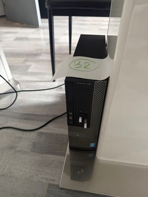 a computer that is sitting on top of a table