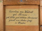 a picture of a sign on a wooden frame