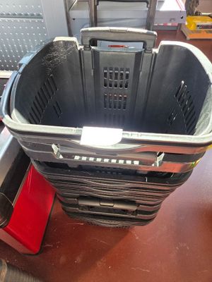 a black basket that is sitting on top of a table