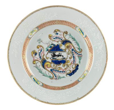 an image of a white plate with a blue and gold design on it