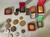 a lot of coins that are sitting on a table