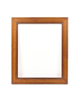 un cadre photo en bois vide sur fond blanc