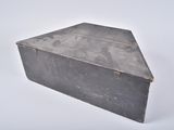 a black box that is sitting on a white surface