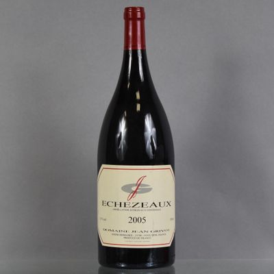 a bottle of wine that is sitting on a table