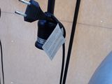 a picture of a desk lamp with a charger attached to it