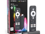 two remotes sitting next to each other in a box