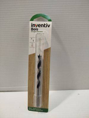 a black and white toothbrush in a package