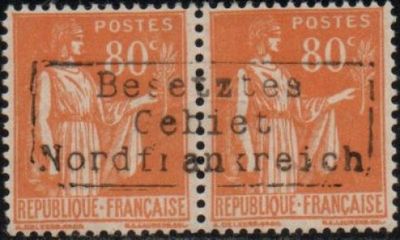 two orange postage stamps with a picture of a woman and a man