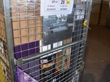 a large metal cage with a sign on top of it