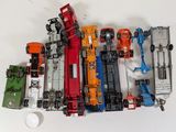 a lot of toy trains that are sitting on a table