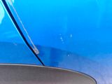 a close up of a car ' s door handle and door handle