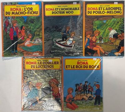 quatre livres pour enfants sont alignés sur une surface blanche