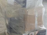 a stack of boxes on a pallet in a warehouse