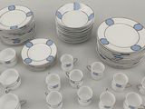 a lot of plates and cups on the table