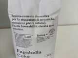 a bag of pasta sitting on a counter next to a bottle of wine