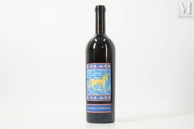 a bottle of wine that is sitting on a table