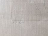 a drawing of a woman on a piece of cardboard