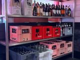 many bottles of wine on the shelves in the room