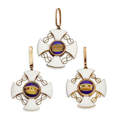 a set of three gold and enamel pendants with a crown