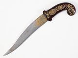 a knife that is laying on a white surface