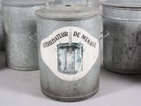 many tins that are lined up on the table