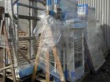 a pallet full of water bottles sitting on a pallet