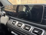 a picture of a car dashboard with a cell phone in it