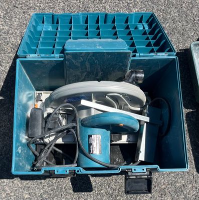 a blue box with a bunch of items inside of it