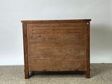 an image of a wooden chest with drawers on top of it