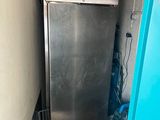an image of a stainless steel refrigerator in a room