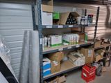 many boxes and boxes on the shelves in the garage