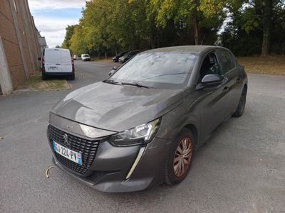 a grey car parked on the side of the road