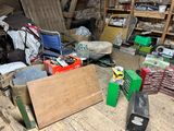 a pile of junk on the floor in a room