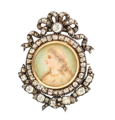 une broche ancienne en diamant et émail représentant le portrait d'une dame
