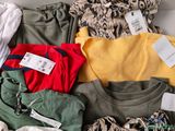 a lot of clothes that are in a box