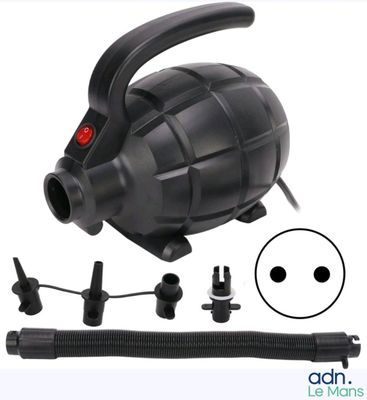 an image of a black blower with a red light on top of it