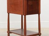 an image of a small wooden table with a shelf underneath it
