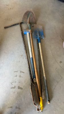a lot of tools that are laying out on the floor