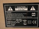 a sign on the back of a box that says caution don ' t open