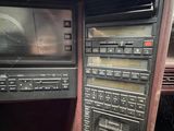 dashboard of a car with a lot of electronic equipment in it