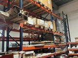 many shelves with boxes and boxes on them in a warehouse