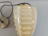 a light that is on the wall next to a lamp