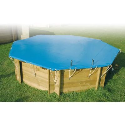 a wooden pool with a blue cover on top of it