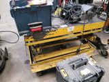 a picture of a workbench with tools on it in a garage