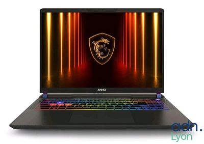 un ordinateur portable avec un logo coloré sur l'écran